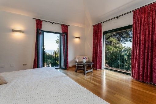 The bedroom offers stunning sea views